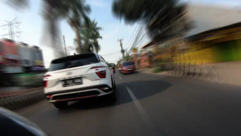 A time lapse of riding a motorcycle on evening at east bekasi Stock Footage 253191578