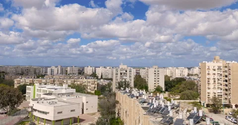 Time-lapse with rise camera to clouds over a simple city neighborhood Stock Footage 91980233