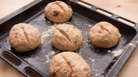 Time-lapse of rising dough of bread rolls Stock Footage 72820792