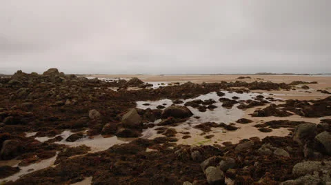 Time lapse rising tide over beach Stock Footage 23928464