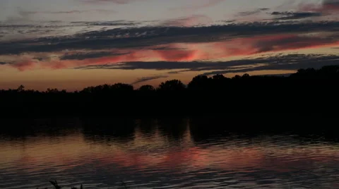 Time Lapse of River and clouds moving at dusk Stock Footage 53034272