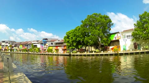 Time lapse of river and colourful buildings in Melaka. 4K resolution Stock Footage 40065564