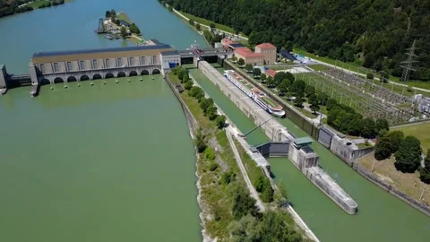 Time lapse of a river cruise ship leaving the lock at a Danube hydropower plant Stock Footage 340779784