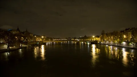 Time-lapse of river flowing against sky at night in Paris city Stock Footage 106150476