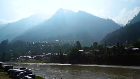 Time lapse of river with lush green mountains in hilly area of Pakistan. Stock Footage 200758769