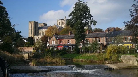 Time lapse river skell flowing by ripon cathedral yorkshire uk Stock Footage 119060018