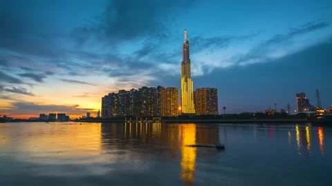 Time lapse of riverside urban area at sunset sky Stock Footage 164589566
