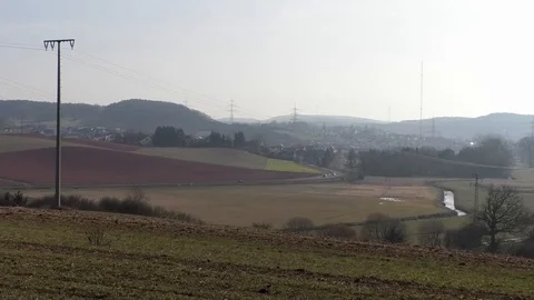Time lapse: Road leading through rural landscape, small village Sambach, Germany Video stock 103421276
