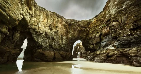 Time lapse with rock formation, arches and caves. Stock Footage 77917635