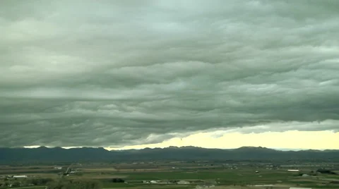 Time Lapse of Roller Coaster Cloud Waves over Rockies Stock Footage 54729221