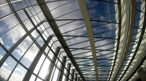 Time lapse of rolling clouds through a glass ceiling 스톡 동영상 32374670
