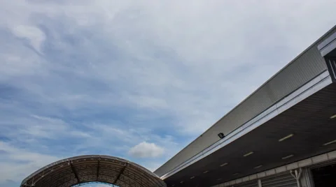 Time lapse rolling clouds at warehouse Stock Footage 44072059
