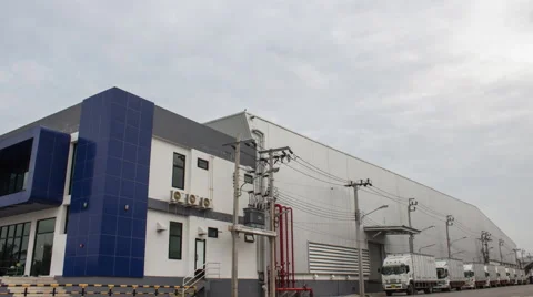 Time lapse rolling clouds at warehouse Stock Footage 44078930