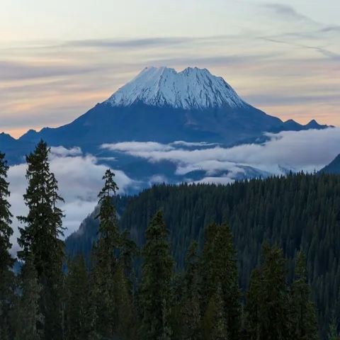 Time lapse of rolling low fog over mount st. helens in Washington at sunset 4k Stock Footage 69491031