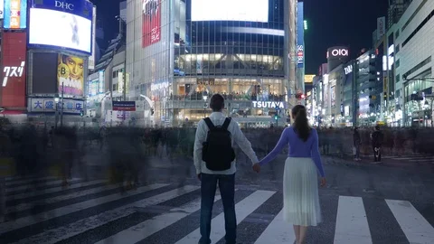 Time Lapse romantic couple posing at Shibuya crossing, Tokyo, Japan Stock Footage 98373224