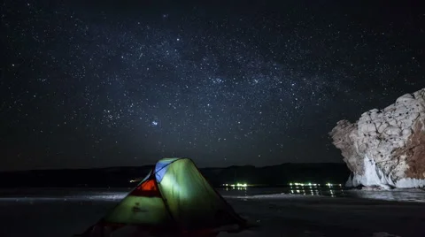 Time lapse of rotating stars above camping Stock Footage 48442653