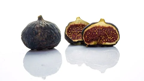 Time lapse of rotting figs on white background, educational video, life and Stock Footage 225169416