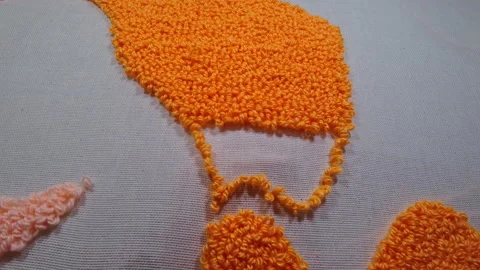 Time lapse of rug tufting with punch needle. Carpet hooking tool. Stock Footage 159702540