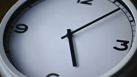 Time lapse of running arrows on wall clock noon time Stock Footage 158037209
