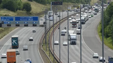 Time lapse rush hour traffic traveling on the A1/M motorway Leeds, UK Stock Footage