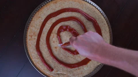Time lapse of rustic home made pizza with hands placing ingredients Stock Footage 52974727
