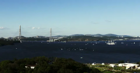 Time lapse of sailing ship and windsurfing. Russky Island, Russian Far East Stock Footage 56563368