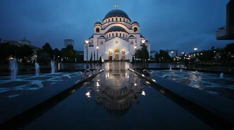 Time lapse of Saint Sava temple on the rainy night Stock Footage 55943200
