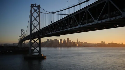 Time Lapse of San Francisco Skyline Oakland Bay Bridge Cargo Ship Sunset Light Stock Footage 109314252