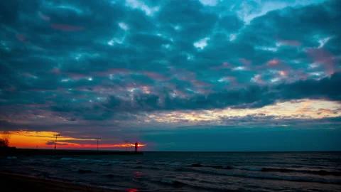 Time-lapse of a sandy beach with dark clouds Stock Footage 147928149