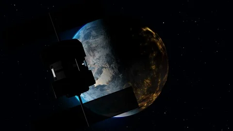 Time lapse of a satellite in orbit watching an abstract Earth clock rotating Stock Footage 121424862