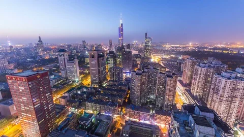 Time lapse: Scape aerial view of the Nanjing skyline from day to night 库存影片 74924729