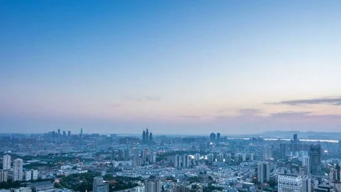 Time lapse: Scape aerial view of the Nanjing skyline from day to night rush hour 스톡 동영상 75649544