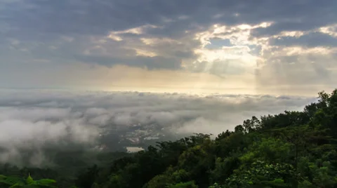 Time-lapse scene of cloudy sky with ray of sun light over city Stock Footage 39068430