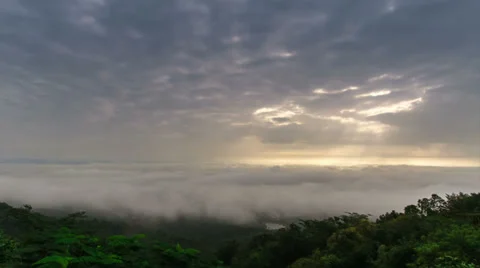 Time-lapse scene of cloudy sky with ray of sun light over city Stock Footage 39071903