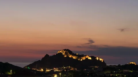Time lapse of scenic city lights in Myrina, Greece. Beautiful night sky above Stock Footage 115702953