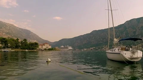 Time lapse of scenic view at island with moored boat. Stock Footage 80245277