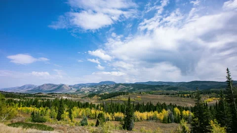 Time-lapse - Scenic view over the hills, valleys and mountains with the clouds Video stock 145520548