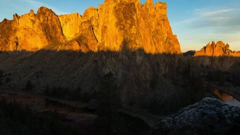 Time Lapse Scenic View Of River Amidst Rock Formations In Sunlight - British Stock Footage 160314453