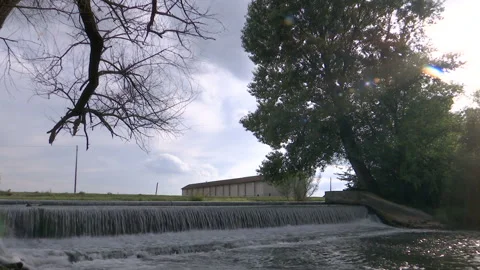 Time lapse of a scenic waterfall on a cloudy day Stock Footage 138483178