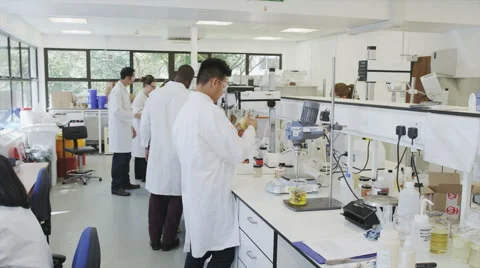Time lapse science Lab &amp; scientists working on cosmetics, medicines &amp; analysis Stock Footage 41587568