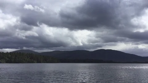 Time lapse of Scottish loch with mountains and cloudscape Stock-Footage 101610246
