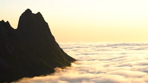 Time lapse of sea of clouds over fjord in Senja under midnight sun Video stock 113214121