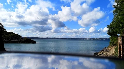 Time lapse at Sea - Reflective Clouds Vídeo Stock 119692624