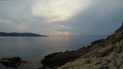 Time lapse by the sea of ​​a sunset Stock Footage 236974733