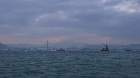 Time Lapse of Sea Traffic Day to Night shot of Tsing Yi Bridge Stock Footage