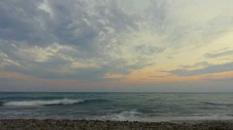Time lapse of sea waves and rocks at a beach in Aegean sea in Greece Stockbeeldmateriaal 68989262