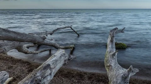 Time lapse of sea waves, beach and clear blue sky Stock Footage 242777921