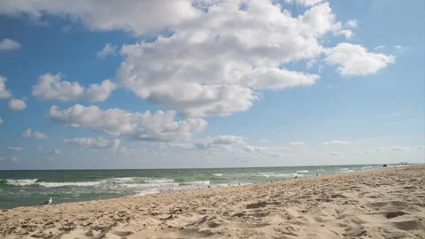 Time lapse of a seascape with sandy beach. Kurortnoe, Ukraine. Stock Footage 267045444
