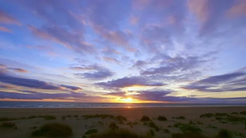 Time-lapse of seascape at sunset, clouds in dramatic sky Stock Footage 147307189