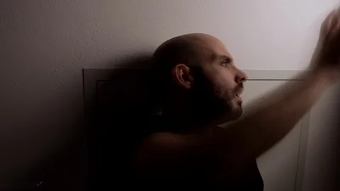 Time lapse of Segregated man going crazy. Segregation concept. Quarantine Stock Footage 126999759